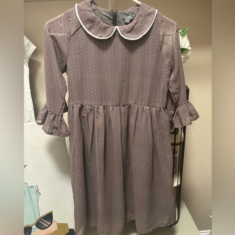 Girls polka dot dress sizes with flared sleeves and collar. Girls 12-13 years